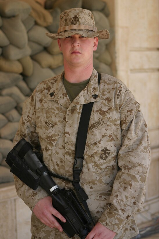 CAMP BLUE DIAMOND, AR RAMADI, Iraq -- Sergeant Jeffrey Allen Wick, a 27-year-old Syracuse, N.Y. native works in the 2nd Marine Division's combat operations center as the watch chief.  The former Onondogo Community College student is the main link for information from the battlefield to the officers commanding this unit.  U.S. Marine Corps photo by Sgt. Stephen D'Alessio (RELEASED)