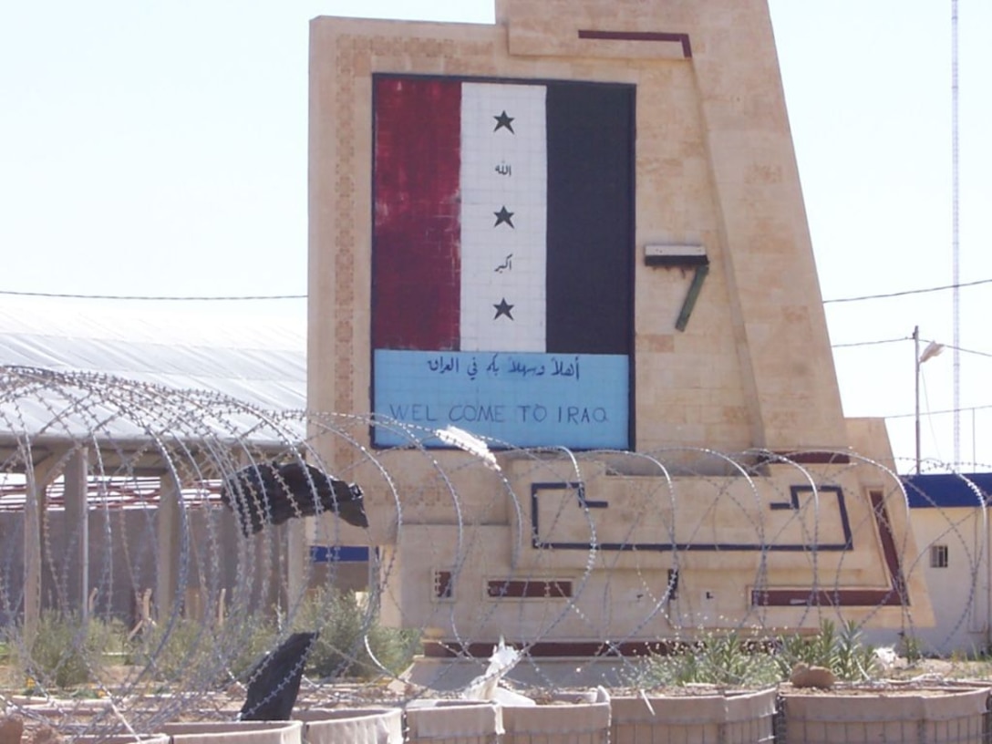 HUSAYBAH, Iraq - A sign welcoming those crossing the Syrian border to Iraq near Camp Gannon as it appeared before the insurgent attack on April 11.