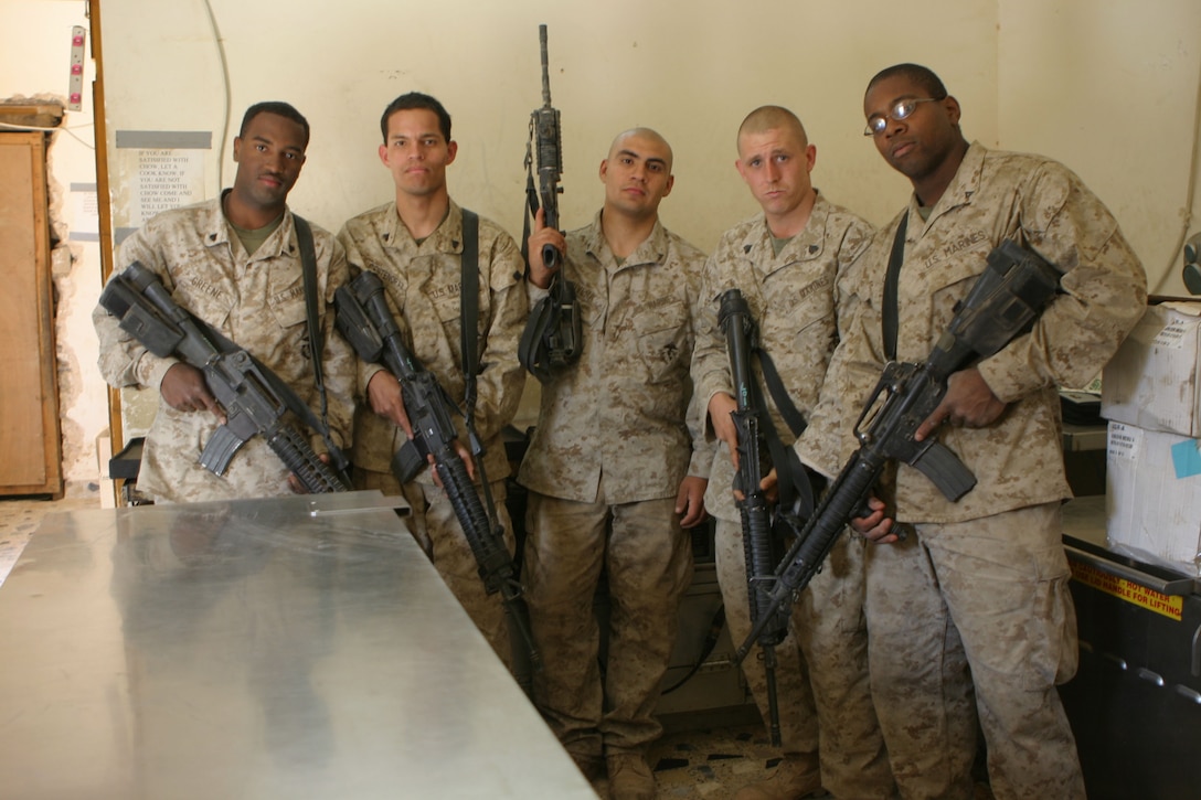 HUSAYBAH, Iraq (May 2, 2005)- (Left to right) Cpls. Terrell Green, an Atlanta native, Jose Centenopaz, a Honduras native, Lance Cpl. Jose L. Rivera, a Hebbronville, Texas native, Sgt. Donald E. Lockridge Jr., a Northwebster, Ind., native, and Lance Cpl. Melvin D. Carson, a Virginia Beach, Va., native are all food service specialist currently attached to India Company, 3rd Battalion, 2nd Marine Regiment, Regimental Combat Team-2 in Husaybah. Official U.S. Marine Corps photo by Lance Cpl. Lucian Friel (RELEASED)