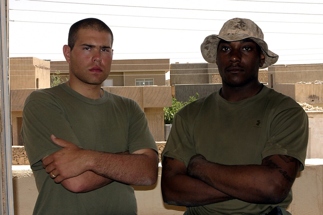 Haditha, Al Anbar, Iraq (May 26, 2005) -  Lance Cpl. Antone M. Uzonyi, a 20-year-old Pittsbrugh native, and  Lance Cpl. Jeremey T. Dunlap, 18 of Wheatland, Penn., both infantrymen with 3/25 Kilo company pose for a picture during a break in a mission recently.  (Official USMC photo by Cpl. Ken Melton)