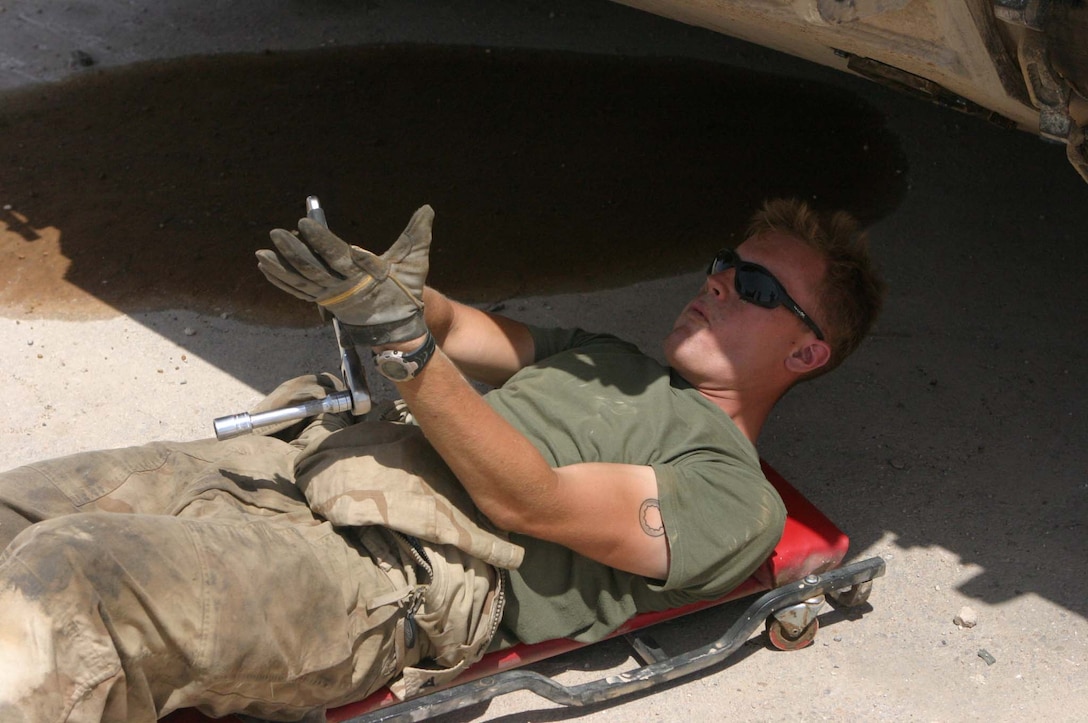 LCpl. Jonathan M. Griffith, M1A1 main battle tank repair technician/M1A1 tank crewman, Headquarters Platoon, Company A, 1st Tank Battalion, 7th Marine Regiment, Regimental Combat Team-2, works two jobs to ensure that the Marines' tanks stay operational. (Photo by LCpl. Zachary W. Lester)