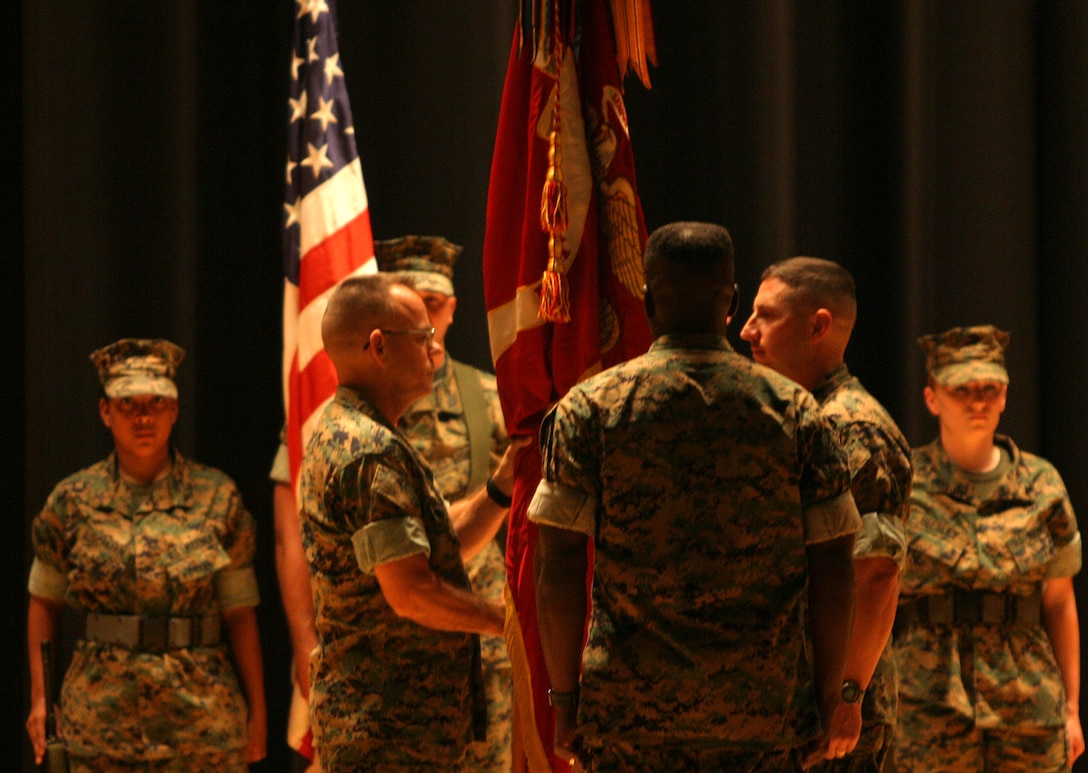 MARINE CORPS BASE CAMP LEJEUNE, N.C. (Sept. 8, 2005) -  Family, friends and colleagues were present as Honolulu native, Col. Thomas L. Cariker relinquished command of 10th Marine Regiment, 2nd Marine Division, to Lt. Col. Christopher Mayette of South Bend, Ind., at a change of command ceremony here Sept. 9.