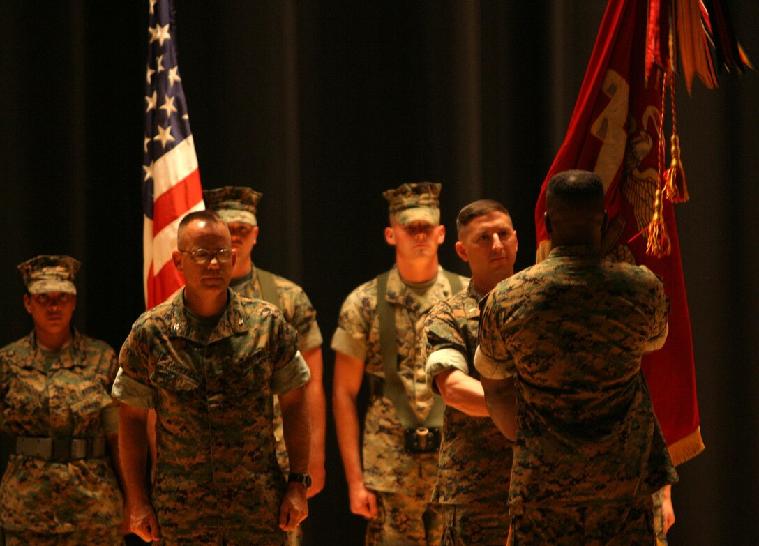 MARINE CORPS BASE CAMP LEJEUNE, N.C. (Sept. 8, 2005) -  Family, friends and colleagues were present as Honolulu native, Col. Thomas L. Cariker relinquished command of 10th Marine Regiment, 2nd Marine Division, to Lt. Col. Christopher Mayette of South Bend, Ind., at a change of command ceremony here Sept. 9.
