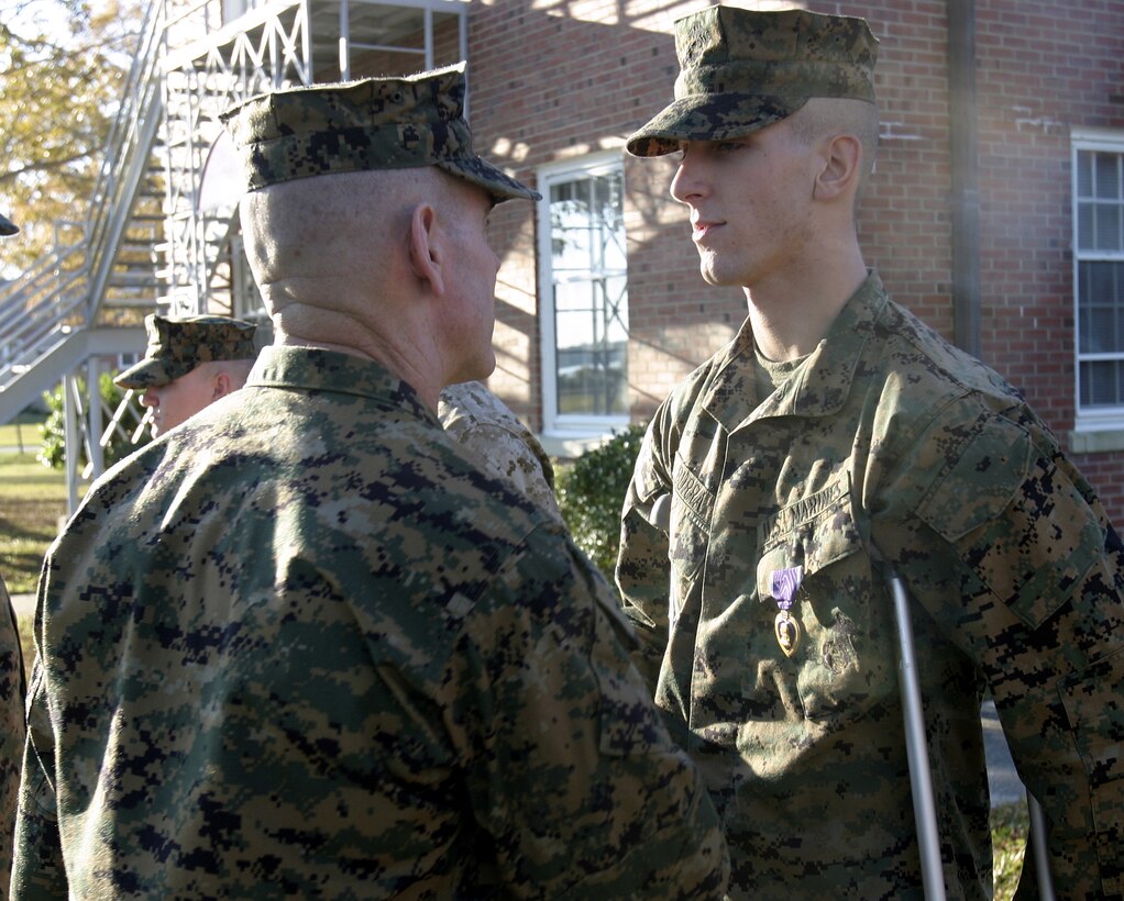 MARINE CORPS BASE CAMP LEJEUNE, N.C. (Nov. 22, 2005) ? Lance Cpl. Johnny R. Burra was injured in combat after only a year and a half in the Marine Corps.   The rifleman with 2nd Battalion, 2nd Marine Regiment was awarded the Purple Heart medal here Nov. 30 for injuries received while serving in Operation Iraqi Freedom.