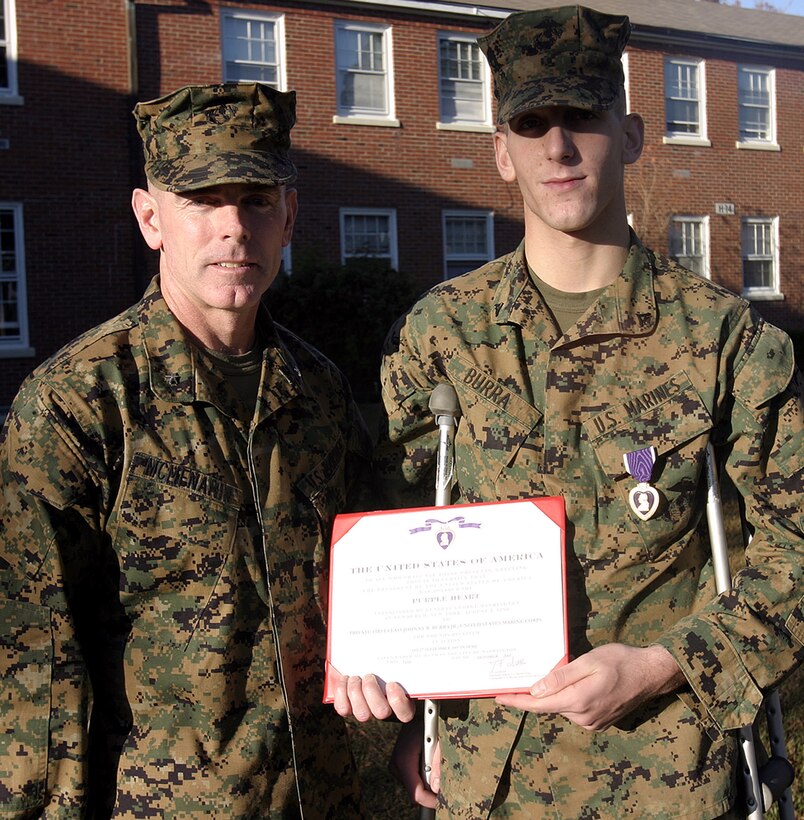 MARINE CORPS BASE CAMP LEJEUNE, N.C. (Nov. 22, 2005) ? Lance Cpl. Johnny R. Burra was injured in combat after only a year and a half in the Marine Corps.   The rifleman with 2nd Battalion, 2nd Marine Regiment was awarded the Purple Heart medal here Nov. 30 for injuries received while serving in Operation Iraqi Freedom.