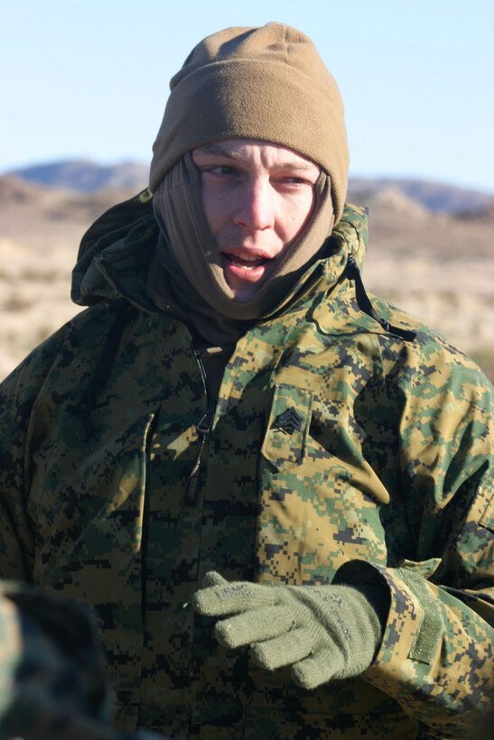 050111-M-4224F-002 29 PALMS, Calif.- Sergeant Justin A. Nye, a native of Phoenix, discusses ways to succeed during the range before Marines of 3rd Battalion, 2d Marine Regiment conduct the training. Nye, a 1998 Chino Valley High School graduate, is a platoon sergeant and a rifleman with 3rd Battalion, 2d Marines. U.S. Marine Corps photo by Lance Cpl. Lucian Friel (RELEASED)