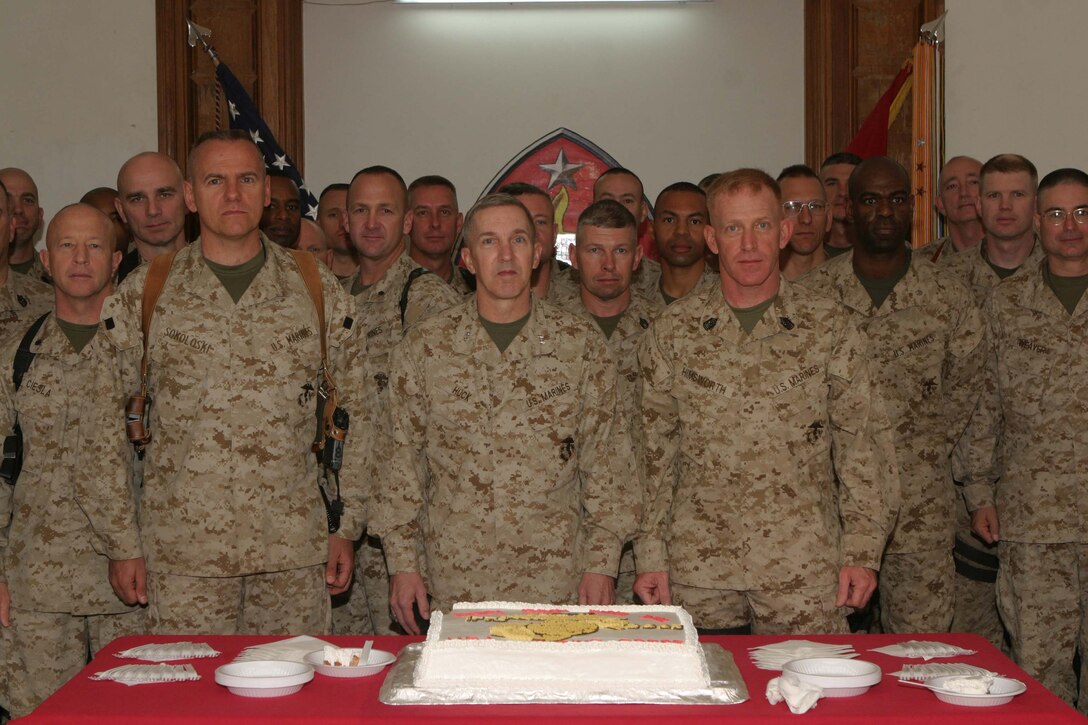 CAMP BLUE DIAMOND, RAMADI, Iraq -  Major General Richard Huck, commanding general 2d Marine Division, and his primary staff took time away from their busy schedules to celebrate the Marine Corps 230th Anniversary here. Official U.S. Marine Corps photo by Sgt. Ryan S. Scranton