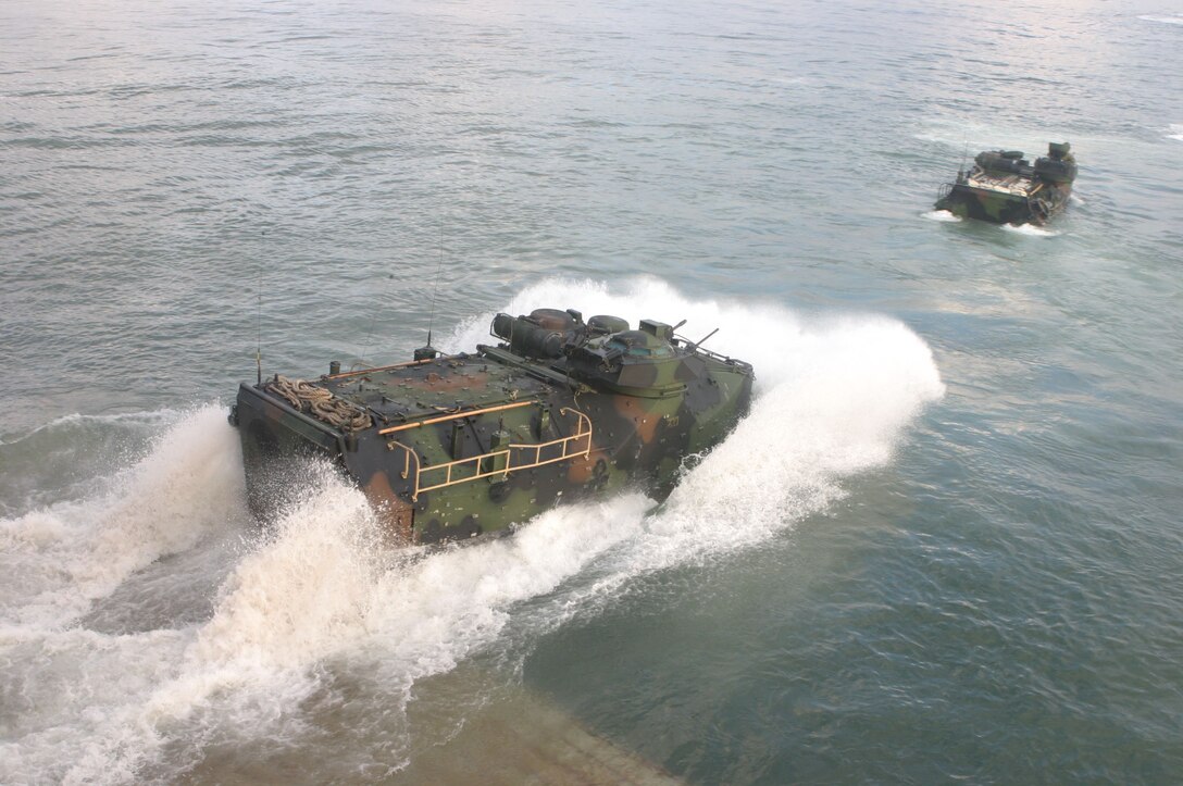 MARINE CORPS BASE CAMP LEJEUNE, N.C. (Jan. 10, 2005)- An amphibious assault vehicle with Company B, 2nd Amphibious Assault Battalion, 2nd Marine Division splashes off the USS Whidbey Island off the coast of North Carolina during ship operation training here. The AAV Marines got a chance to get back into the water after a heavy rotation to the desert-urban areas of Iraq.