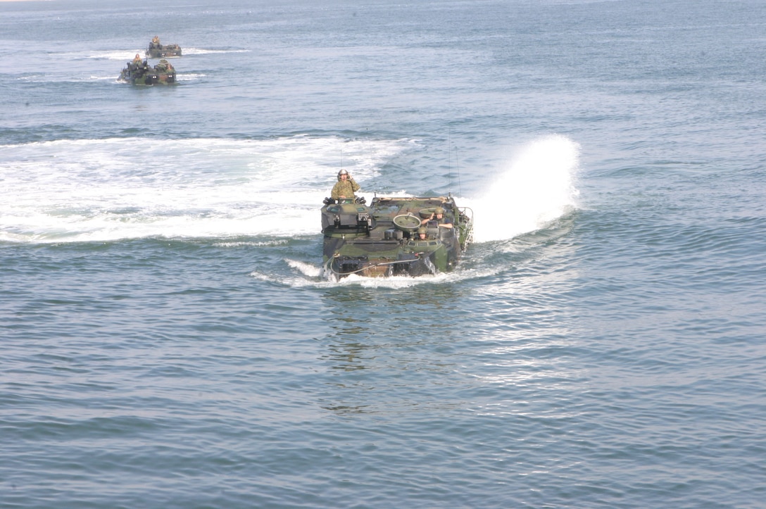 MARINE CORPS BASE CAMP LEJEUNE, N.C. (Jan. 10, 2005)- An amphibious assault vehicle with Company B, 2nd Amphibious Assault Battalion, 2nd Marine Division drives toward the USS Whidbey Island off the coast of North Carolina during ship operation training here. The AAV Marines got a chance to get back into the water after a heavy rotation to the desert-urban areas of Iraq.