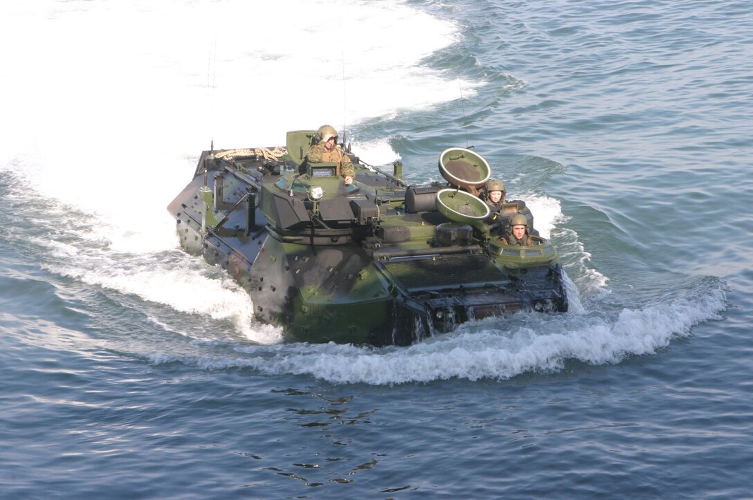 MARINE CORPS BASE CAMP LEJEUNE, N.C. (Jan. 10, 2005)- An amphibious assault vehicle with Company B, 2nd Amphibious Assault Battalion, 2nd Marine Division drives toward the USS Whidbey Island off the coast of North Carolina during ship operation training here. The AAV Marines got a chance to get back into the water after a heavy rotation to the desert-urban areas of Iraq.