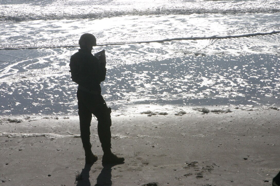 MARINE CORPS BASE CAMP LEJEUNE, N.C. (Jan. 10, 2005)- 1st Lt. Jonathan Morris, a Marine with Company B, 2nd Amphibious Assault Battalion, 2nd Marine Division maps the course to the USS Whidbey Island off the coast of North Carolina during ship operation training here. The AAV Marines got a chance to get back into the water after a heavy rotation to the desert-urban areas of Iraq.