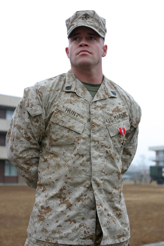 Staff Sgt. Nathan Hunt, a North Benton, Ohio native and platoon sergeant with 2d Battalion, 2d Marine Regiment, 2d Marine Division stand by after receiving a Bronze Star with a combat distinguishing device Jan. 10 for his heroics actions while serving in Iraq.