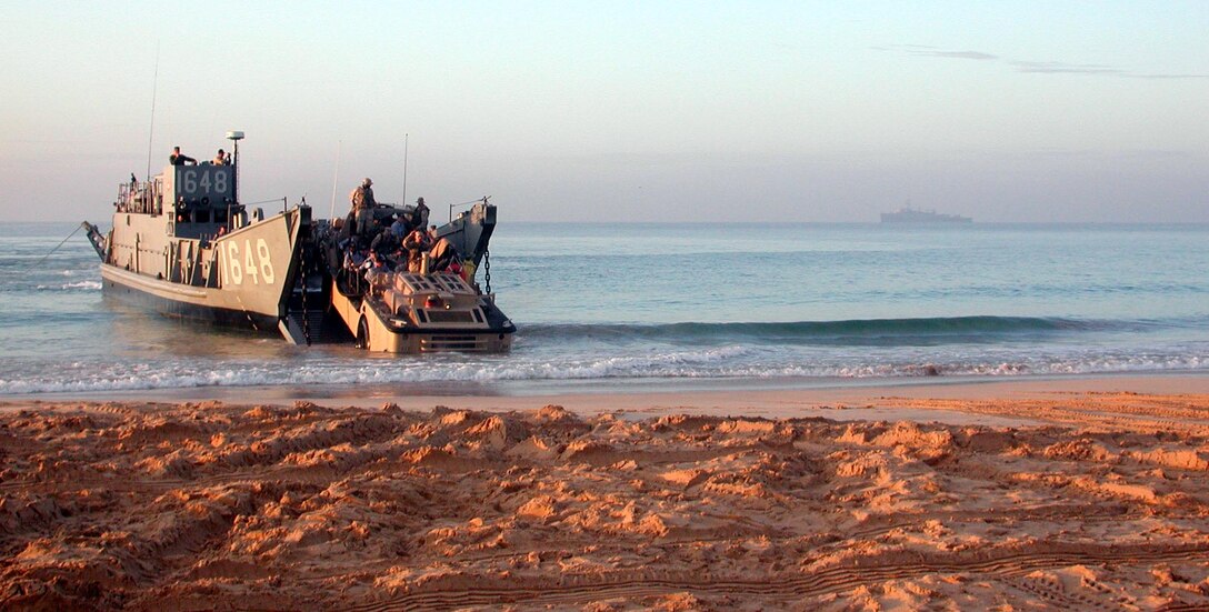 A Landing Craft Utility or LCU unloads equipment on the beach here. The 15th Marine Expeditionary Unit (Special Operations Capable) has been providing desperately needed humanitarian aid to cities and villages along the coast of Sri Lanka's southern coastline.