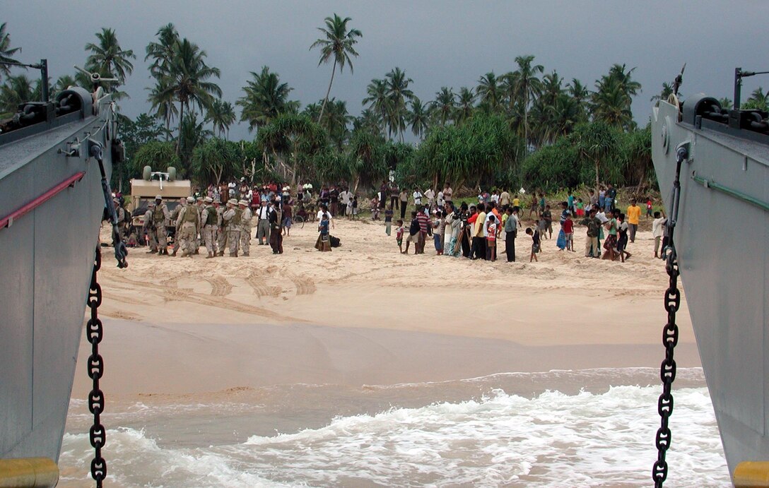 Marines and Sailors board a Landing Craft Utility as they complete humanitarian operations here.  The 15th Marine Expeditionary Unit (Special Operations Capable) provided desperately needed humanitarian aid to cities and villages along Sri Lanka's southern coastline.