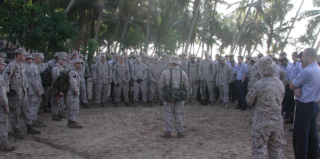 Staff Sgt. Shawn Anderson with the 15th Marine Expeditionary Unit (Special Operations Capable) gives the Marines and Sailors of this unit a daily safety brief before humanitarian relief efforts start here today. The 15th MEU (SOC) has been providing desperately needed humanitarian aid to cities and villages along the coast of Sri Lanka's southern coastline.