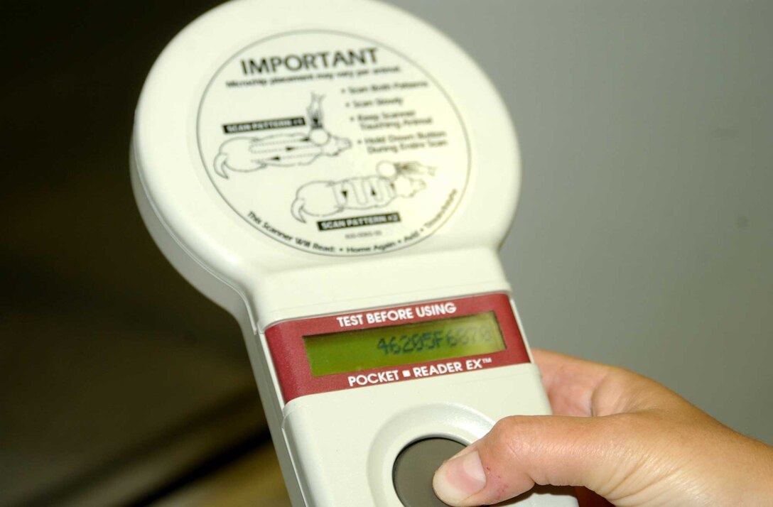 The HomeAgain microchip scanning device displays a personal identification number that can be used through a telephone and Web site service to identify owners.