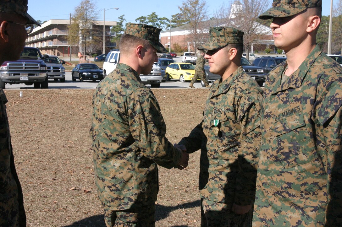 Lance Cpl. Fernando Camacho, a scout with 2nd Light Armored Reconnaissance Battalion (LAR), 2nd Marine Division, was awarded the Navy and Marine Corps Commendation Medal for action taken during Operation Iraqi Freedom in a ceremony here Dec. 12. (Photo by Lance Cpl. Zachary W. Lester)