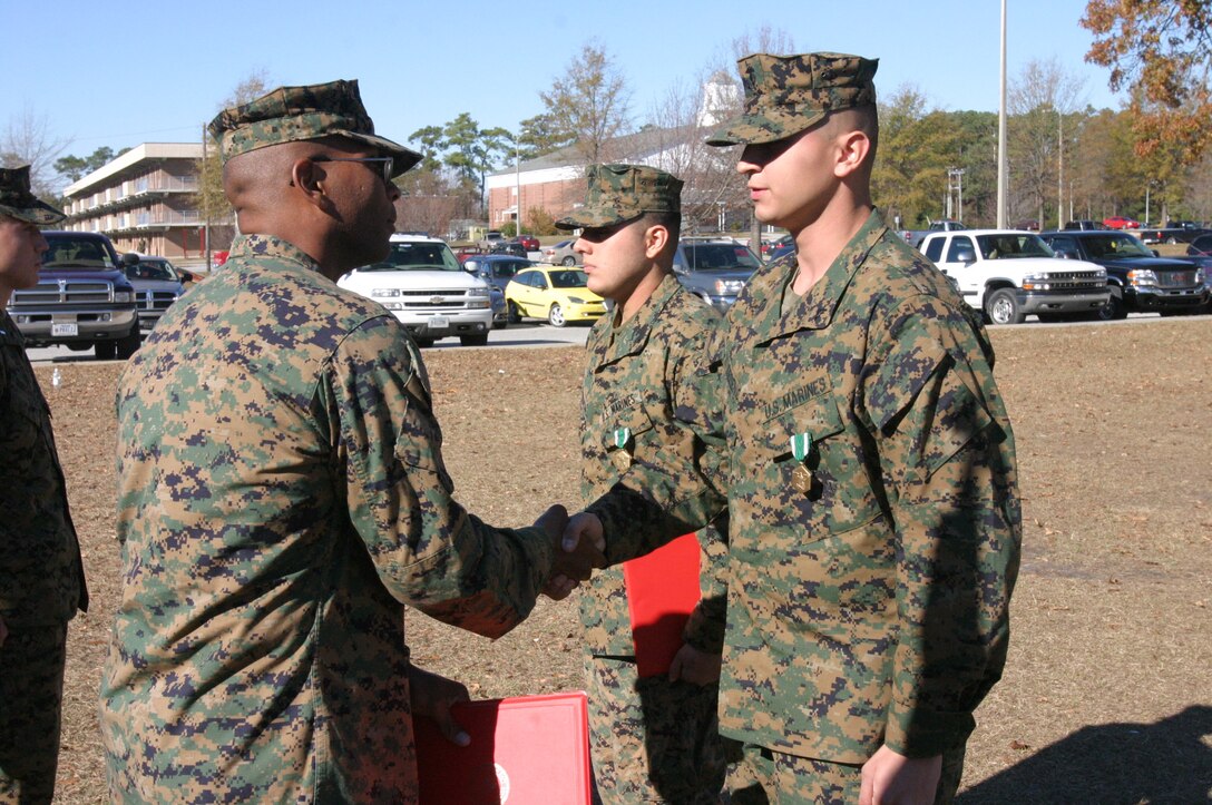 Lance Cpl. Joseph Cedono, a scout with 2nd Light Armored Reconnaissance Battalion (LAR), 2nd Marine Division, was awarded the Navy and Marine Corps Commendation Medal for action taken during Operation Iraqi Freedom in a ceremony here Dec. 12. (Photo by Lance Cpl. Zachary W. Lester)
