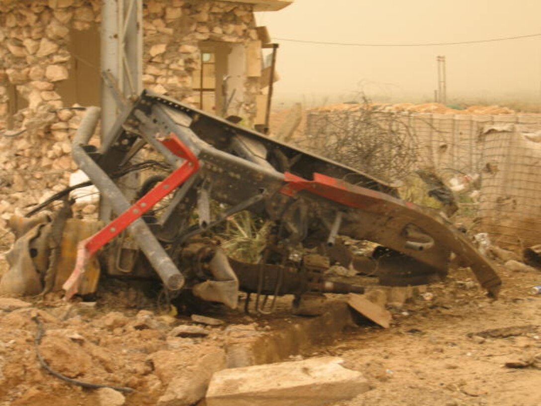 HUSAYBAH, Iraq - The remains of a Fire Truck used as a suicide vehicle-borne improvided explosive device lays approximately 30 meters from the post of the Marine who stopped it with precision fire from his squad automatic weapon.