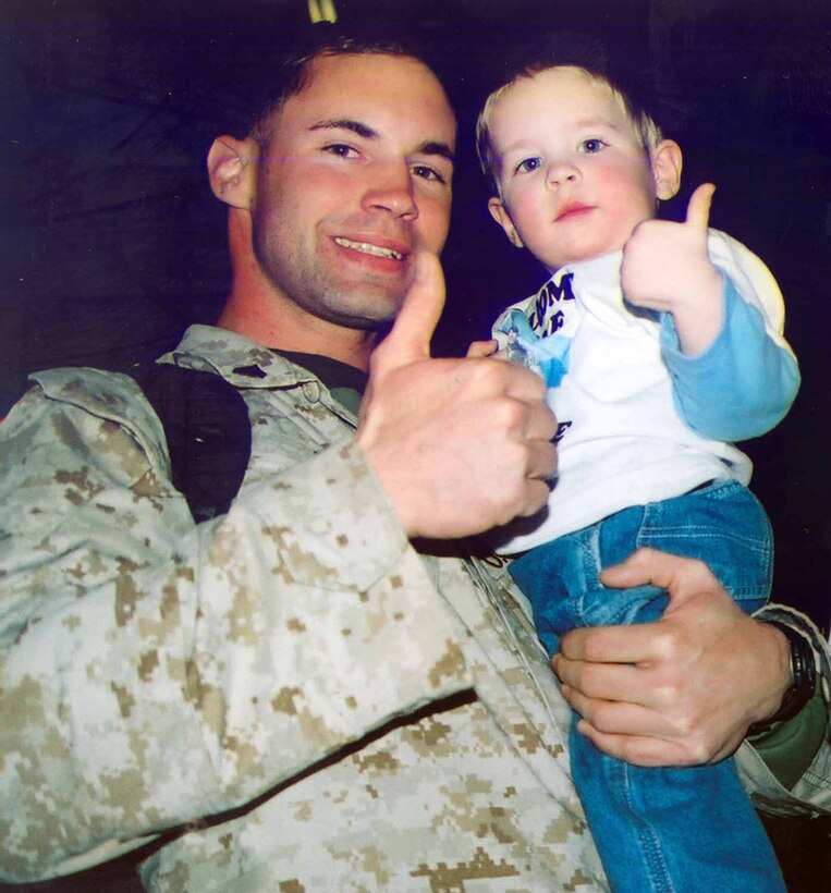 Every thing is alright with Cpl. Joseph Zawol of 6th Communication Battalion as he holds his tiny nephew fresh from a long eight months on deployment in Iraq.