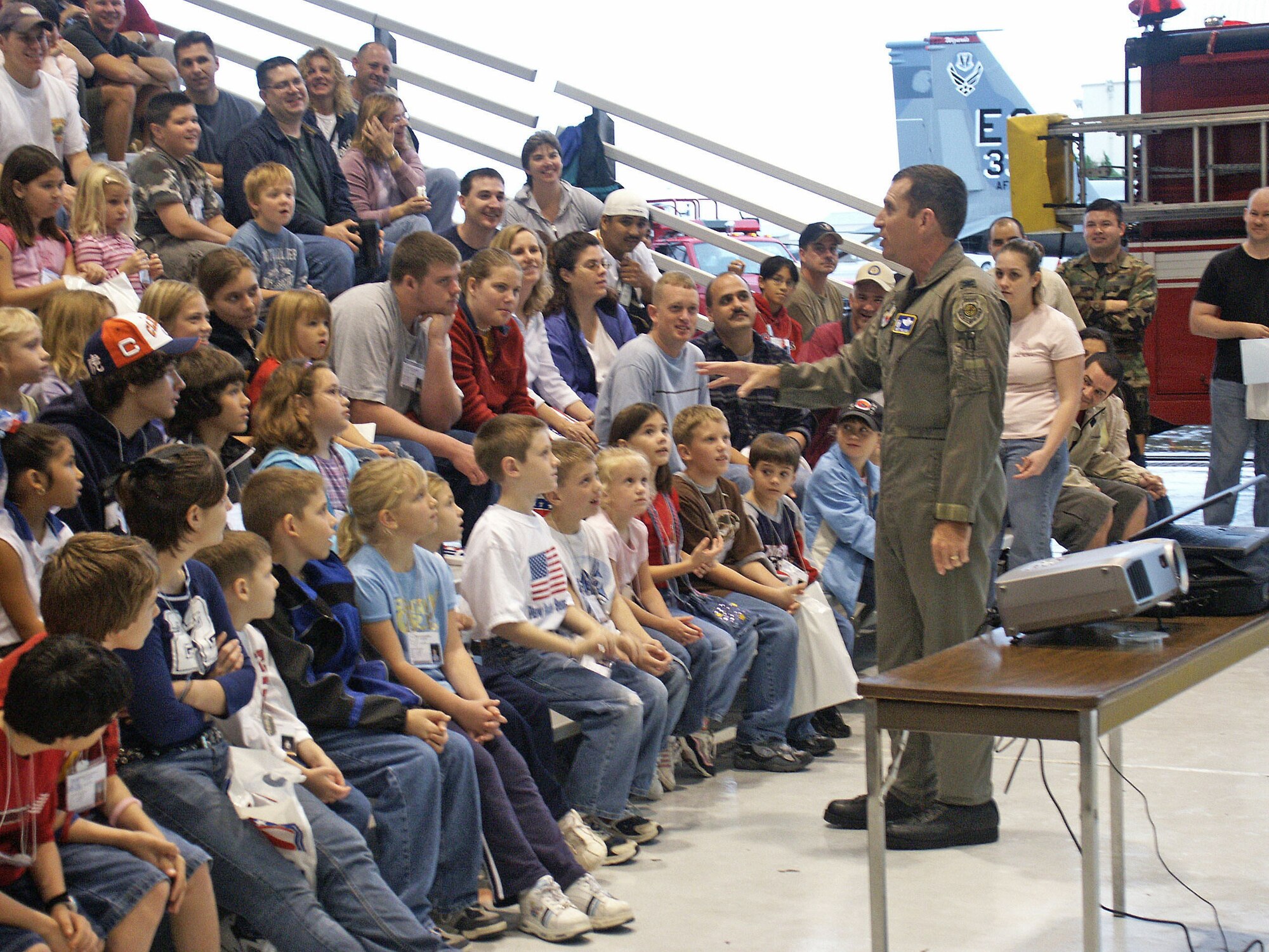 EGLIN AIR FORCE BASE, Fla. -- Col. Brett Williams, 33rd Fighter Wing commander, talks with families before the kick off of Operation Hero on Jan. 8.  The event was designed to help children better understand what a deployment is and what happens when their parents deploy.  (U.S. Air Force photo by Staff Sgt. Robert Zoellner)