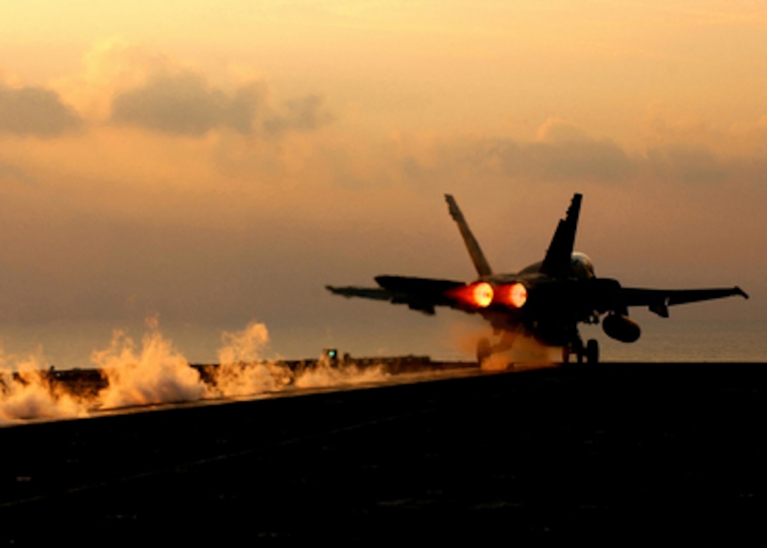 A Marine F/A-18 Hornet launches from one of four steam-powered catapults on the flight deck of the aircraft carrier USS Harry S. Truman (CVN 75) on Jan. 2, 2005. The Truman and its embarked Carrier Air Wing 3 is providing close air support and conducting intelligence, surveillance, and reconnaissance missions over Iraq while operating in the Persian Gulf. The Hornet is assigned to the Fixed Wing Marine Fighter Attack Squadron. 