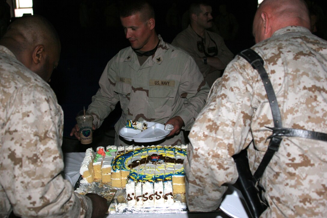 In fine Navy tradition, Sailors enjoyed coffee and cake as they celebrated the Navy?s Birthday, Oct. 13, while deployed in Al Asad, Iraq. Sailors from all over Al Asad got a chance to meet and socialize during the event.