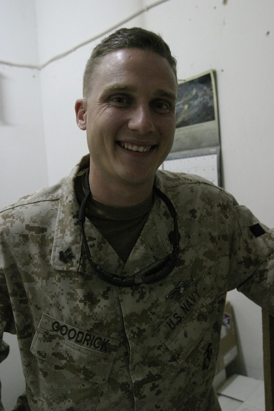 CAMP RIPPER, AL ASAD, Iraq (August 13, 2005)- Petty Officer 2nd Class Rory D. Goodrick, 25, from Newport, N.C., is a religious program specialist with Regimental Combat Team-2. The 1998 West Carteret High School graduate explained the need for a new chapel in the camp due to the closeness to the front gate and the much needed space for church services. (Official U.S. Marine Corps photo by Lance Cpl. Lucian Friel (RELEASED)