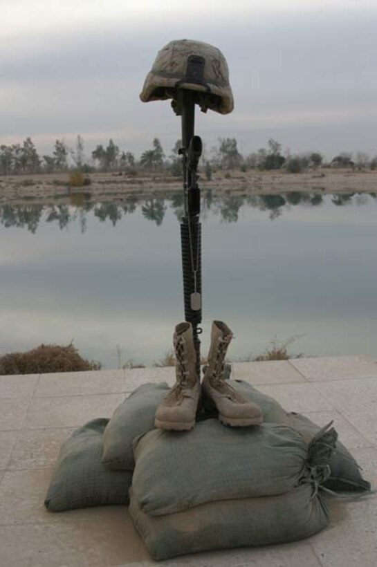 A memorial stands for Cpl. William G. Taylo,r a 26-year-old Kansas City, Mo. Native, who was killed in action Nov. 30, 2005 by anti-coalition forces while deployed with Weapons Company, 2nd Battalion, 6th Marines. His fellow Marines gathered to pay their respects and celebrate his life Dec. 13.