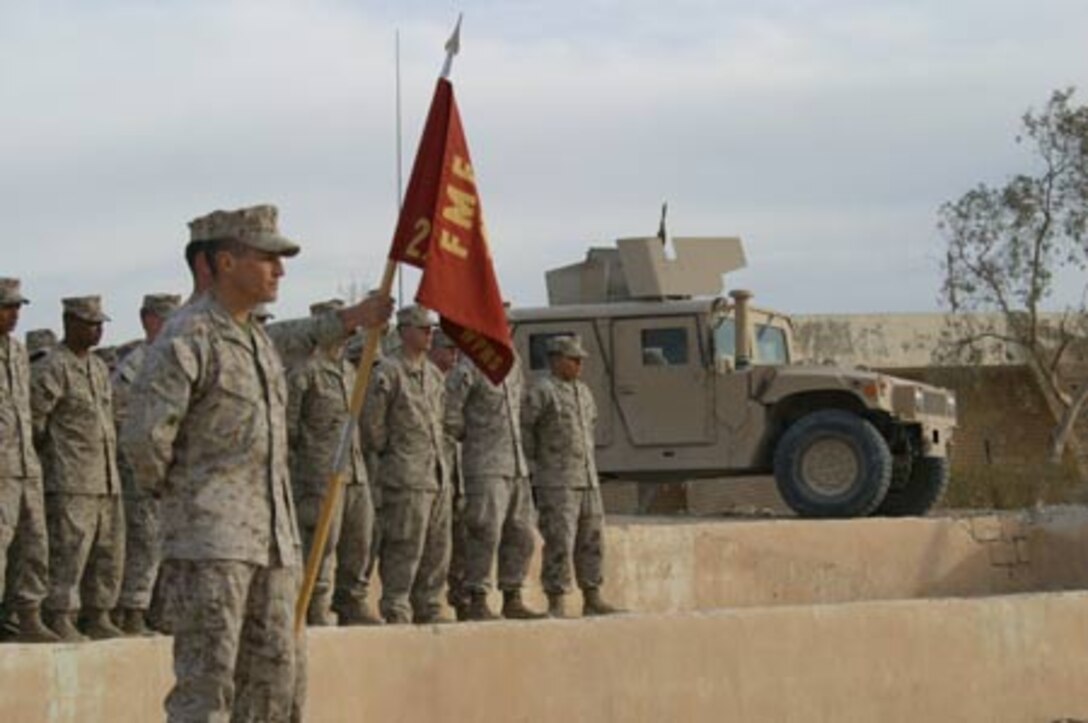 Marines from Weapons Company 2nd Battalion, 6th Marines gather Dec. 13 to pay respect to a fallen comrade Cpl. William G. Taylor, a 26-year-old Kansas City, Mo. Native, who was killed in action Nov. 30, 2005 by anti-coalition forces while deployed with the battalion.