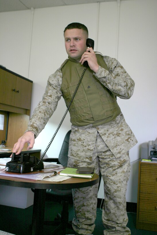 Corporal John R. Glynn calls the shots on more than four million dollars.  He isn't an executive at some major company with a six digit salary but the 28 year-old from Atlanta, Ga. still loves what he does.  The money he controls buys gear for Marines deploying to Iraq.  Official U.S. Marine Corps photo by Cpl. Shawn C. Rhodes