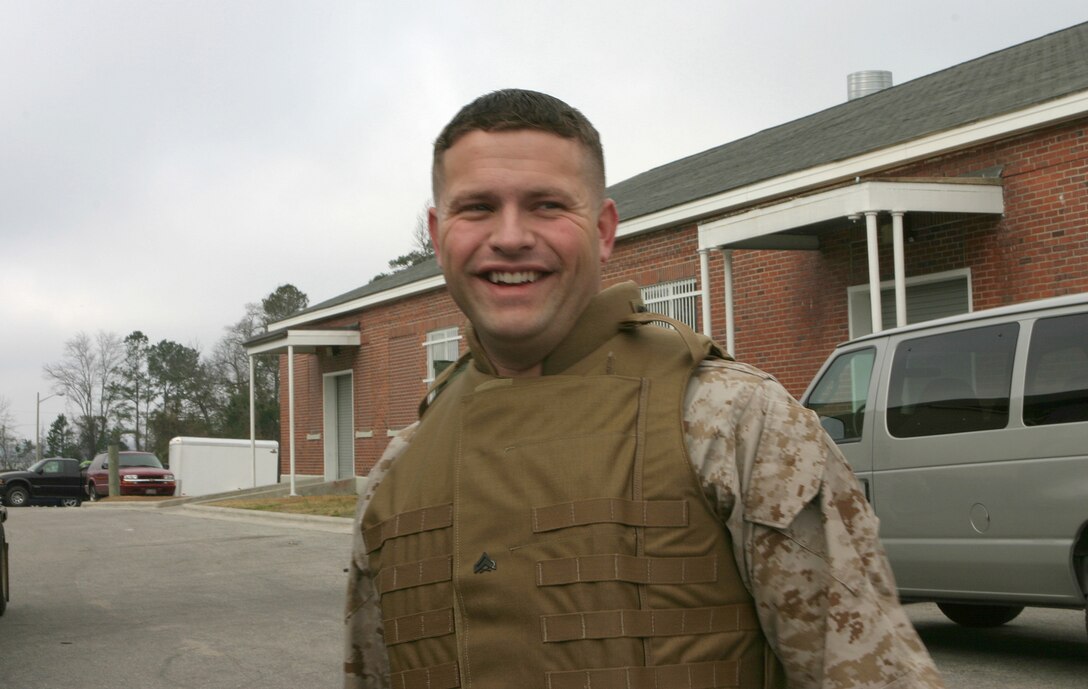 Corporal John R. Glynn calls the shots on more than four million dollars.  He isn't an executive at some major company with a six digit salary but the 28 year-old from Atlanta, Ga. still loves what he does.  The money he controls buys gear for Marines deploying to Iraq.  Official U.S. Marine Corps photo by Cpl. Shawn C. Rhodes