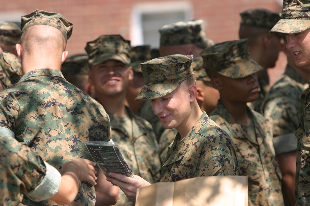 MARINE CORPS BASE CAMP LEJEUNE, N.C. (June 13, 2005) – Marines with 2nd Battalion, 2nd Marine Regiment, 2nd Marine Division received Under Armour t-shirts and socks here June 14, from Operation Troop Appreciation, a non-profit organization founded by Kristen Holloway.