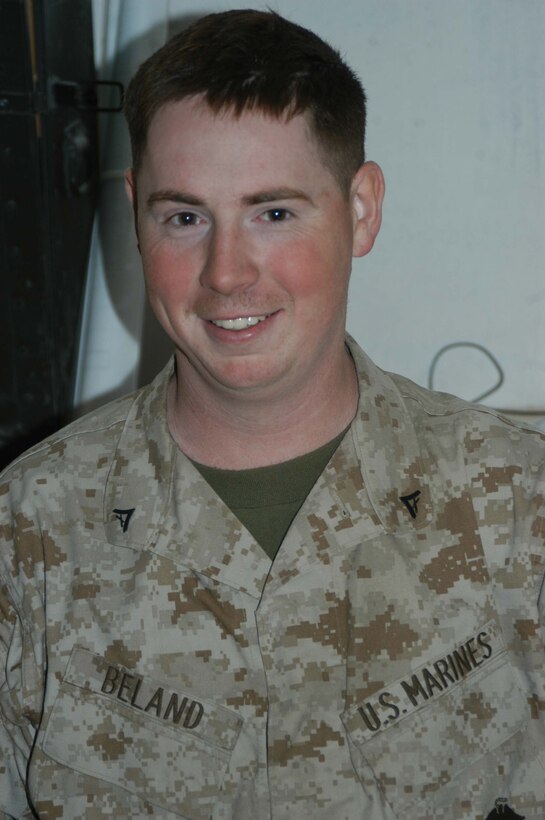 HURRICANE POINT, Ar Ramadi, Iraq (March 14, 2005) - Twenty-two-year-old Lance Cpl. Richard E. Beland from Garner, N.C., is the mail clerk for 1st Battalion, 5th Marine Regiment. The 2000 Garner Senior High School graduate is responsible for collecting, sorting and distributing mail to the more than 900 Marines in the infantry battalion. (Photo by Cpl. Tom Sloan)