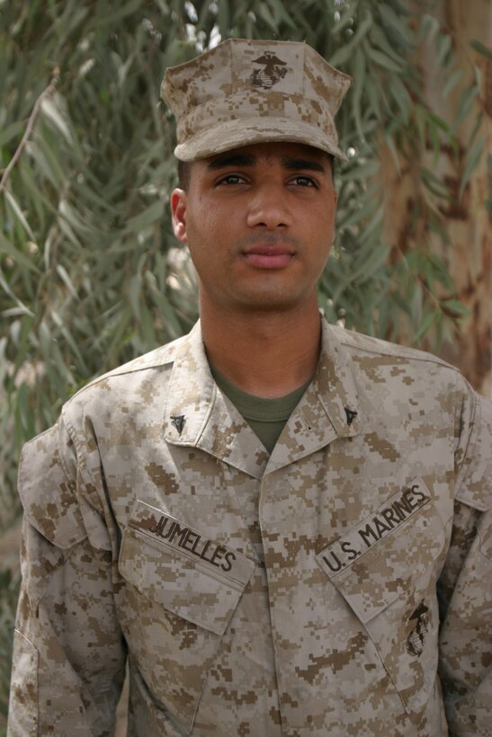 CAMP BLUE DIAMOND, AR RAMADI, Iraq - Lance Cpl. Wilson Jumelles is a 24-year-old food services specialist with Headquarters Battalion, 2d Marine Division, a unit that deployed here for stability and security operations as part of Operation Iraqi Freedom.  He was brought up in the Dominican Republic and moved to Queens, N.Y., to attend school at New Town High School for the class of 2001.  U.S. Marine Corps photo by Sgt. Stephen D'Alessio (RELEASED)