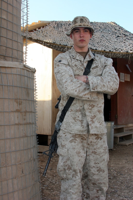 AR RAMADI, Iraq (November 21, 2005) - Private First Class Chase Nelson, a rifleman with Company I, 3rd Battalion, 7th Marine Regiment, is enjoying his time in Iraq and understands that the sooner that they can help the Iraqi Army become solvent, the sooner Coalition Forces will be able to leave Iraq in Iraqi hands. Photo by Cpl. Shane Suzuki