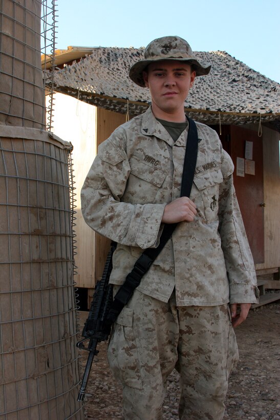 AR RAMADI, Iraq (November 21, 2005) - Lance Cpl. Ryan Burg, a rifleman with Company I, 3rd Battalion, 7th Marine Regiment, is enjoying his time in Iraq and understands that the sooner that they can help the Iraqi Army become solvent, the sooner Coalition Forces will be able to leave Iraq in Iraqi hands. Photo by Cpl. Shane Suzuki