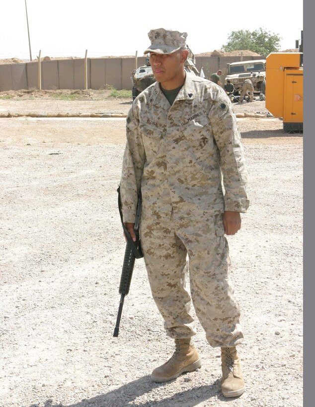 Cpl. Freddy Medina, Civil Affairs Assistant/Gunner, 5th Civil Affairs Group, Regimental Combat Team 2, arrives in Al-Asad to help with a memorial video.  The Annandale, Va., native and 5th CAG work to rebuild the country of Iraq.  (Photo by LCpl. Zachary W. Lester