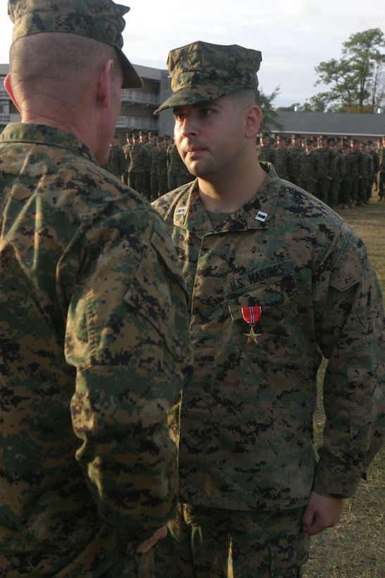 MARINE CORPS BASE CAMP LEJEUNE, N.C. (Nov. 15, 2005)- Capt. Christopher S. Ieva, a North Brunswick, N.J., native receives a Bronze Star Medal from BGen. Joseph J. McMenamin, the assistant division commander. Ieva received the award for his actions as Commanding Officer of Company K, 3rd Battalion, 2nd Marine Regiment, Regimental Combat Team-2, 2nd Marine Division during Operation Iraqi Freedom. (Official U.S. Marine Corps photo by Lance Cpl. Lucian Friel (RELEASED)