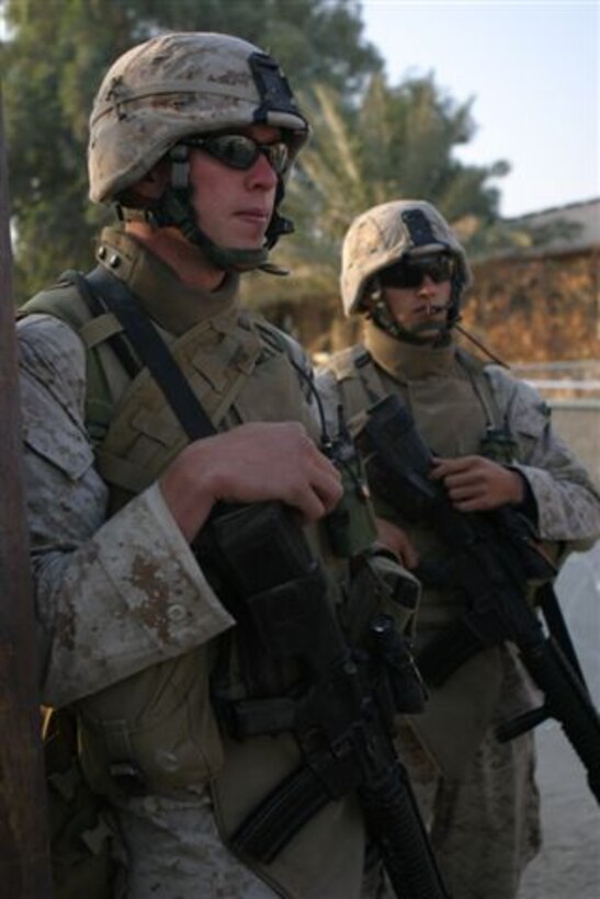 HADITHA, Iraq ? Corporal Scott K. Jepsen of Bridgewater, N.J. provides security during the Iraqi elections here Dec. 15. Jepsen and Team 5, Detachment 2, 6th Civil Affairs Group, worked to make the elections a success in the Haditha area.