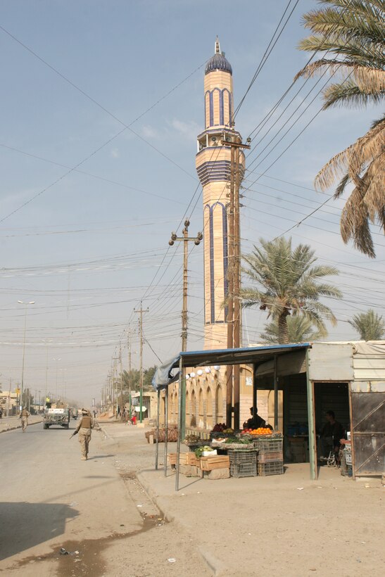 Marines with the 6th Civil Affairs Group, 2nd Marine Division, conduct a foot patrol in Fallujah, Iraq Dec. 15, 2005.