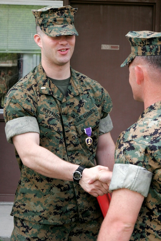 MARINE CORPS BASE CAMP LEJEUNE, N.C. - Second Lieutenant Joseph T. Buffamante, the tank commander for 2nd Platoon, Company C, was awarded the Purple Heart here May 16.  While on deployment to Iraq, Buffamante's tank was hit by an enemy mortar.