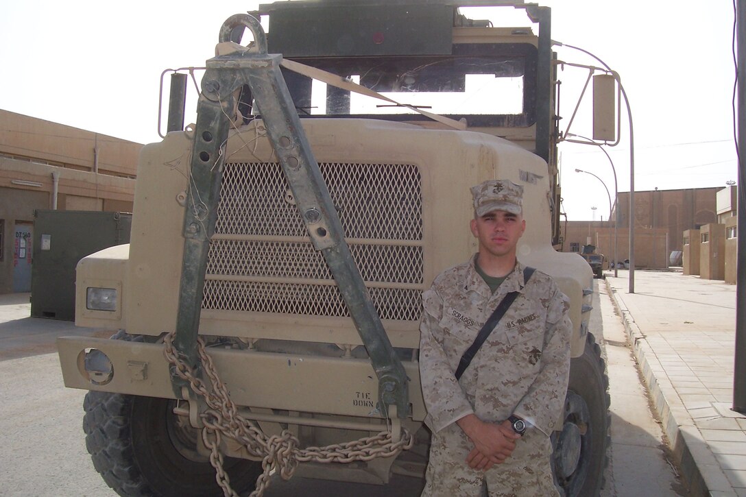 CAMP AL QA'IM, Iraq (June 9, 2005)- Lance Cpl. David S. Scraggs, 22, an embark specialist with 3rd Battalion, 2nd Marine Regiment, Regimental Combat Team-2 is responsible for the mobilization of the battalion. The Knoxville, Tenn., native has experienced the Iraqi culture first hand and discovered the appreciation they have for U.S. forces. Official U.S. Marine Corps photo by Lance Cpl. Lucian Friel (RELEASED)