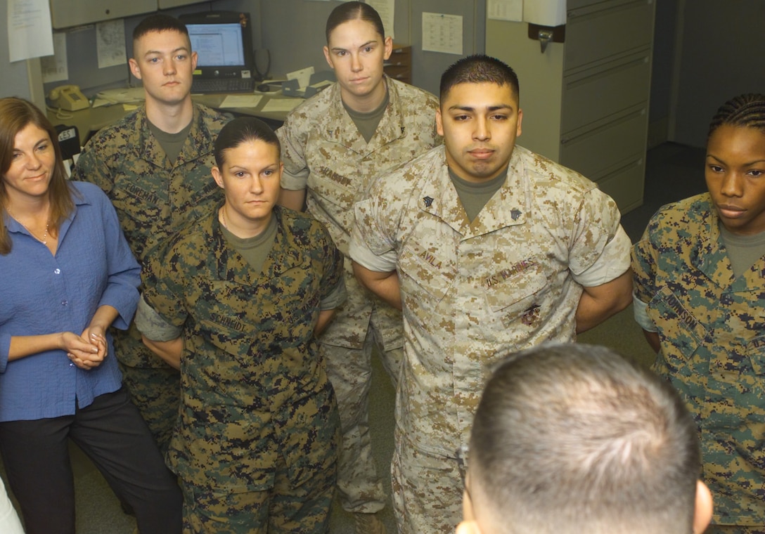 The Marines of the Finance Office, listen intently as Staff Sgt. John P. Kenney, pay and separations Staff Noncommissioned Officer in Charge, passes word onto his crew, about the upcoming move of the office. The Finance Office expects to be out of Barstow this summer, with Marines going to DFAS Kansas City, Mo., as well as the 2nd FSSG at MCB Camp Lejeune, N.C.