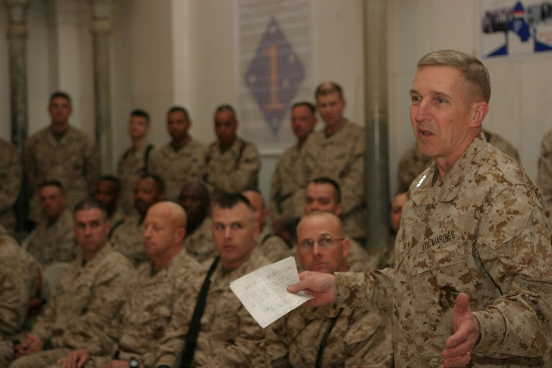 Major Gen. Richard A. Huck, 2d Marine Division commanding general, speaks to his officers and enlisted personnel during the Transfer of Authority ceremony with Maj. Gen. Richard F. Natonski, 1st Marine Division commanding general, March 17.  Natonski relinquished authority of operations in the Al Anbar Province to Huck during the ceremony.  U.S. Marine Corps photo by Sgt. Stephen D'Alessio (RELEASED)