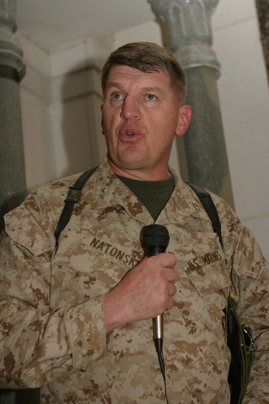 Major Gen. Richard F. Natonski, 1st Marine Division commanding General, speaks to his officers and enlisted personnel in the Transfer of Authority ceremony with Maj. Gen. Richard A. Huck, 2d Marine Division commanding general, March 17.  Natonski relinquished authority of operations in the Al Anbar Province to Huck during the ceremony.  U.S. Marine Corps photo by Sgt. Stephen D'Alessio (RELEASED)