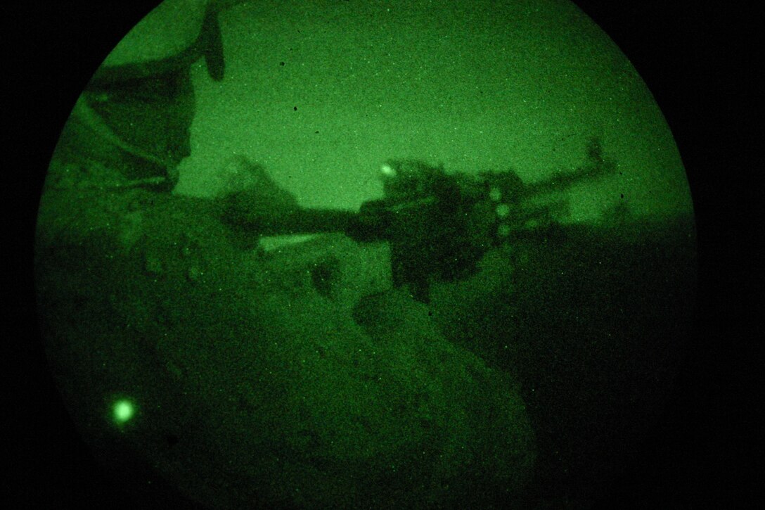 KARABILAH, Iraq- (June 17, 2005)  A member of the Iraqi Security Forces loads his automatic rifle.  Operation Spear is conducted to destroy insurgency leadership strong points.  The Marines of 2d Marine Division conduct counter-insurgency operations with Iraqi Security Forces to isolate and neutralize anti-Iraqi forces, to support the continued development of Iraqi Security Forces, and to support Iraqi reconstruction and democratic elections in order to create a secure environment that enables Iraqi self-reliance and self-governance. (Official USMC photo by Cpl Neill A. Sevelius)(RELEASED)