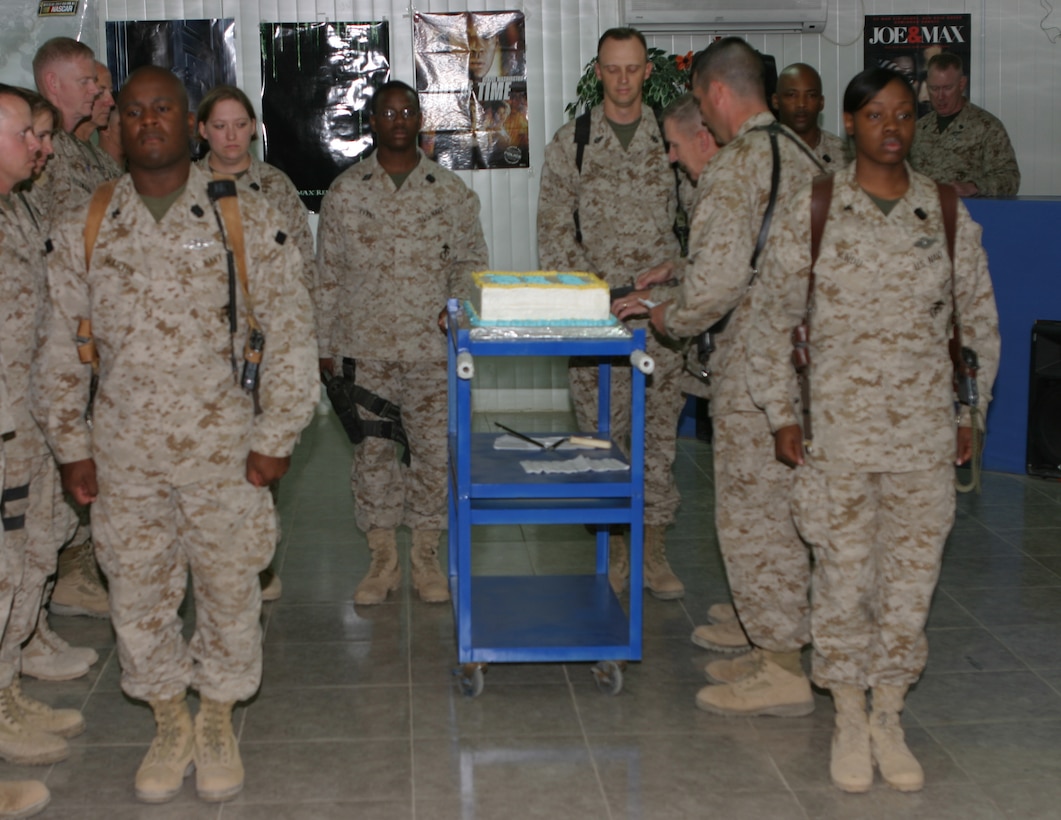 During a cake cutting ceremony held here June 17 to honor the Navy's Hospital Corps' 107th birthday, Maj. Gen. Richard A. Huck, commanding general of the 2nd Marine Division cut the birthday cake and presented the first piece to the oldest Sailor present, Chief Ronald Goforth, signifying the admiration and respect bestowed to those that now carry the proud heritage of the Navy. Goforth then presented the cake to the youngest Sailor present, Seaman Darius L. Evans, signifying the passing of naval heritage to those who follow and will lead the Navy in the future.