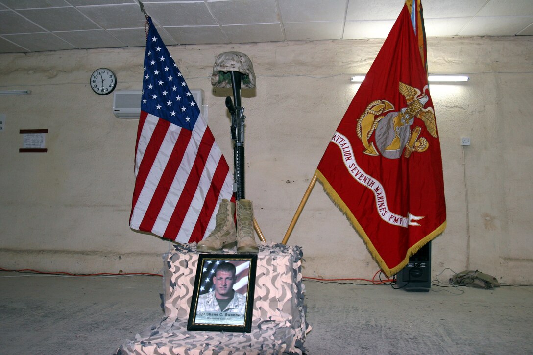 050918-M-8489S-001 AR RAMADI, Iraq (September 18, 2005) - The memorial for Lance Cpl. Shane Swanberg, who died Sept. 15 from indirect fire. Photo by Cpl. Shane Suzuki