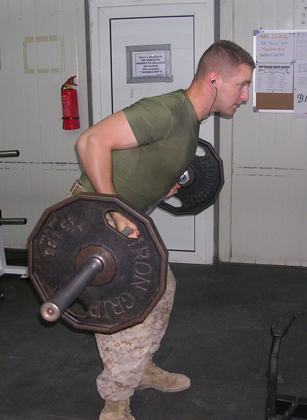 Cpl. Zachary Hosford was one of three 5th Civil Affairs Group Marines, who helped start up a weightlifting competition at Camp Fallujah last month.